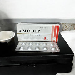 Amodip 5mg Tablets  (1 Strip = 10 Tablets)